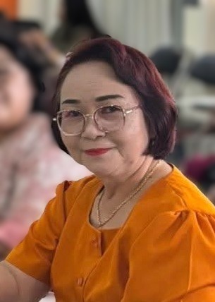 Dra. Henny J. Polii, M.Si